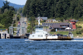 caption: Ferry systems serving San Juan, Skagit, and Whatcom counties are looking for funding options to solve service challenges; over-budget bids have temporarily stalled the planned all-electric replacement of the aging ferry between Anacortes and Guemes Island.