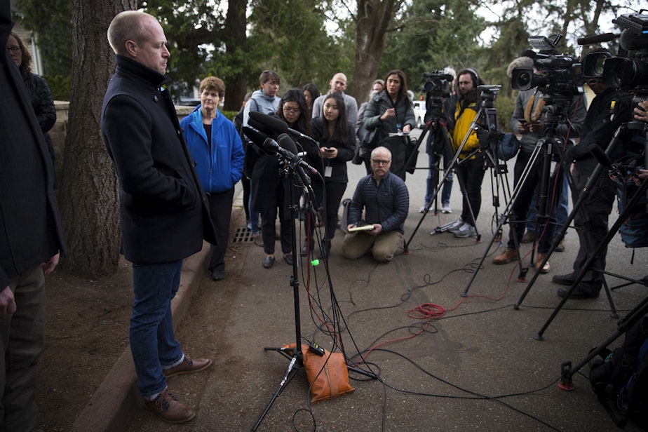caption: Kevin Connolly speaks to the press outside of the Life Care Center of Kirkland on Thursday, March 5, 2020, in Kirkland.