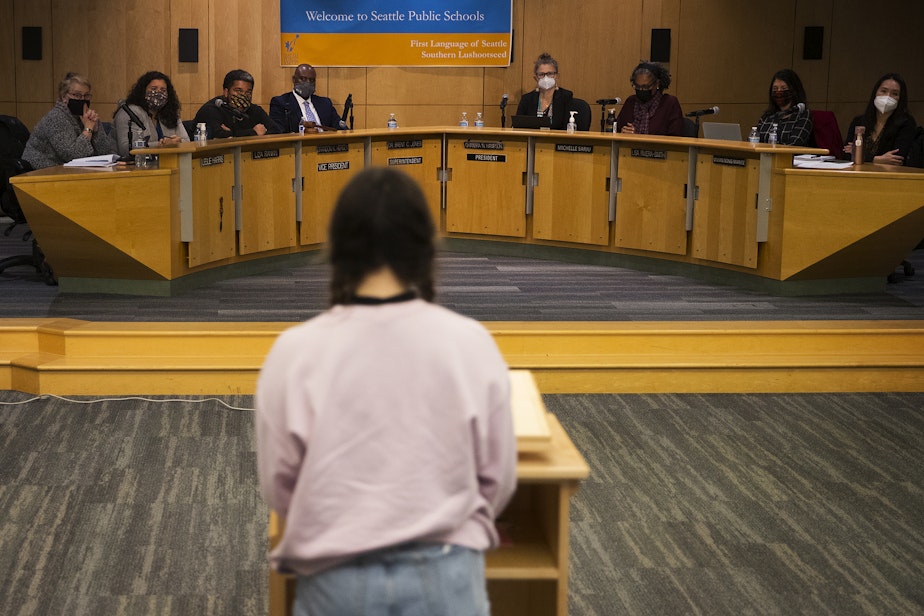 caption: Zirahuen Herrejon-Crutcher, a student at Ballard High School, details her experience with sexual assault and how it was handled by the school district, to the Seattle Public Schools school board, on Wednesday, December 1, 2021, in Seattle.