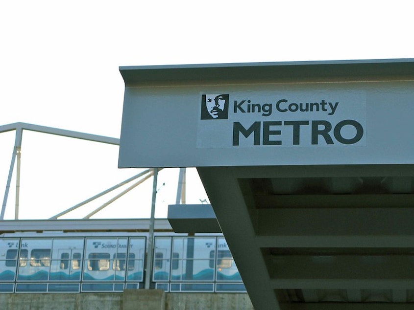 caption: A King County Metro bus station near a Sound Transit light rail station in the Seattle area.