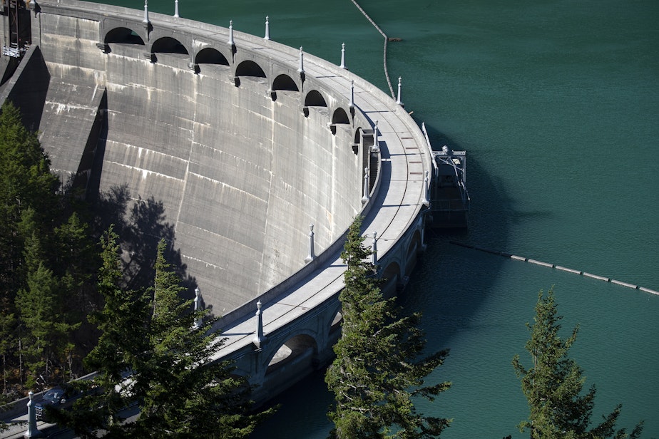 caption: A view of the upper Skagit River and the Diablo Dam, one of three dams in the Skagit River Hydroelectric Project supplying power to the city of Seattle, on Wednesday, June 7, 2023, in Whatcom County.