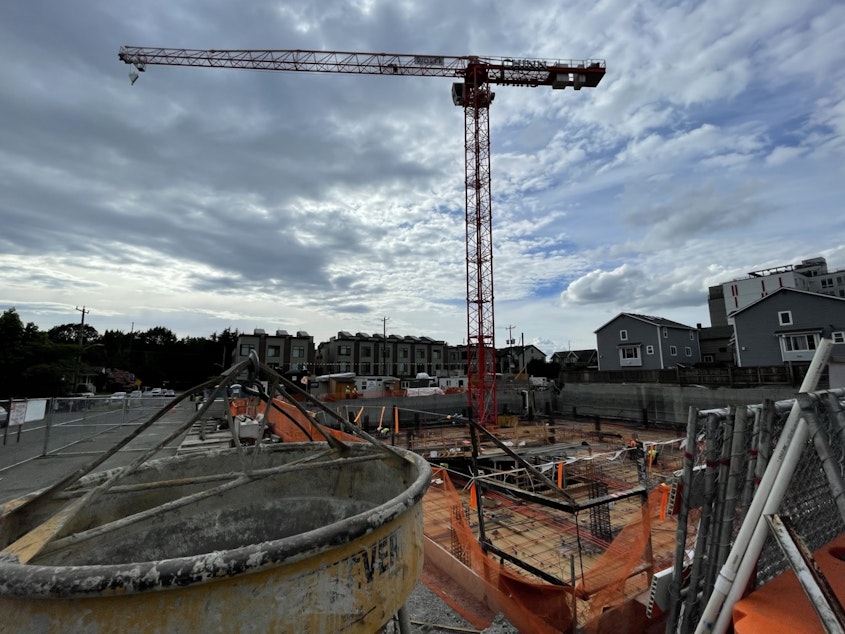 caption: A multi-family apartment building under construction in Seattle's Roosevelt neighborhood