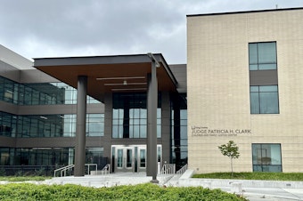 caption: King County's juvenile justice center in Seattle, pictured on Aug. 7, 2023.