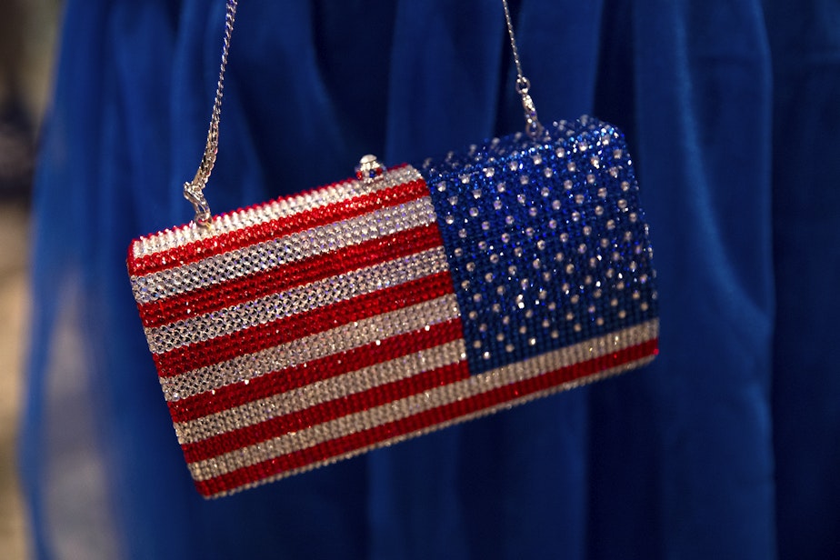 caption: Elyse Johnson wears a sparkling American flag purse on Tuesday, November 5, 2024, ahead of the Washington Democrats election night party at the Seattle Convention Center in Seattle.