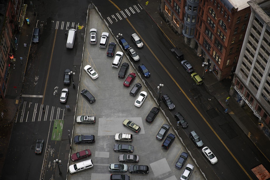 caption: Cars are shown parked from the Smith Tower observatory on Friday, December 1, 2017, in Seattle.