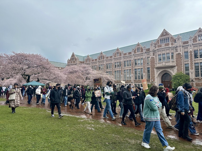 caption: University of Washington students marched to the administrative building during a protest March 28, 2024.