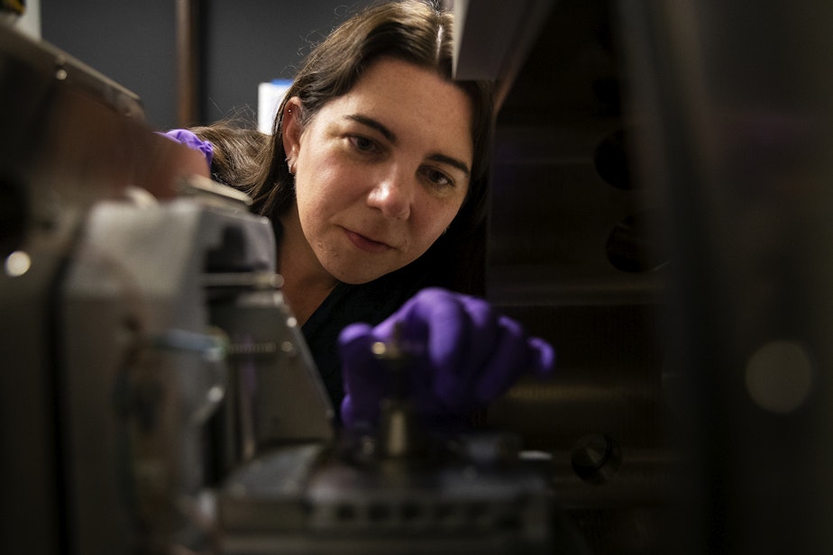 caption: Linda Conway, senior product engineer at Lumotive, prepares to analyze a semiconductor chip sample under SEM (scanning electron microscope) on Thursday, May 25, 2023, at Lumotive’s lab in Redmond.