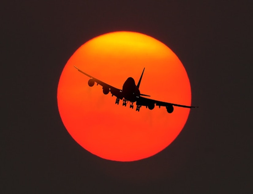 caption: A Boeing B-747-400 landing at Travis Air Force Base in Fairfield, Calif.