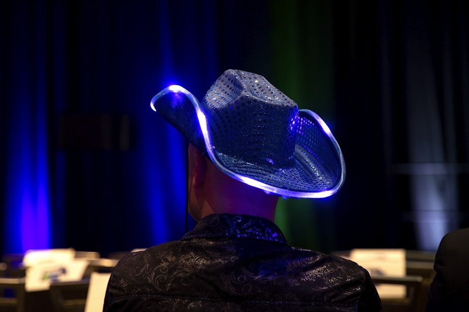 caption: A democratic supporter wears a blue cowboy hat on Tuesday, November 5, 2024, before the Washington Democrats election night party at the Seattle Convention Center in Seattle.