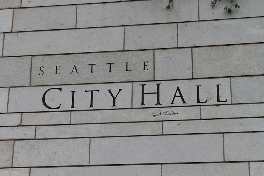 caption: The sign at Seattle City Hall.