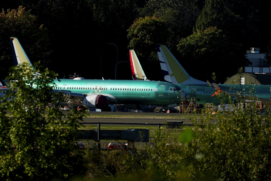 caption: Unpainted Boeing 737 Max aircraft are seen, Tuesday, Sept. 24, 2024, at the company's facilities in Renton, Wash.