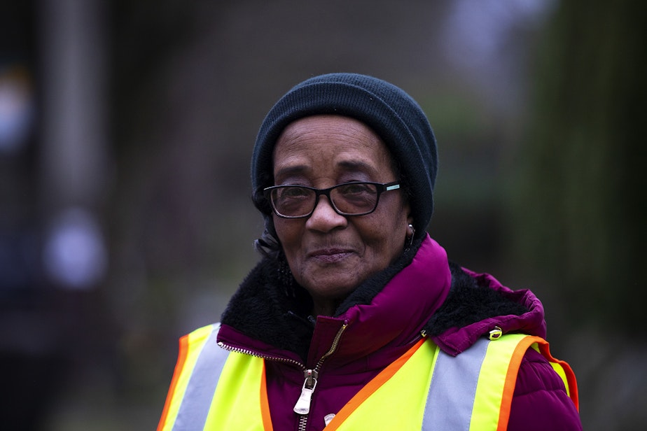 caption: Betty Gray, 80, is portrayed outside of Stevens Elementary on Tuesday, Jan. 14, 2025, in Seattle.