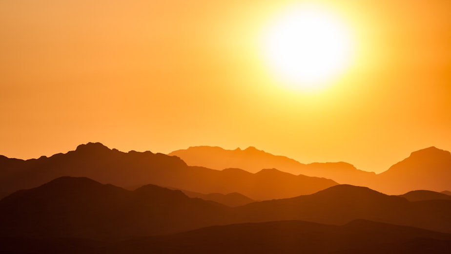 caption: The sun radiates over Nevada.
