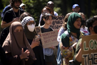 caption: University of Washington students gather ahead of the UW Board of Regents meeting on Thursday, May 9, 2024, on campus in Seattle. 
