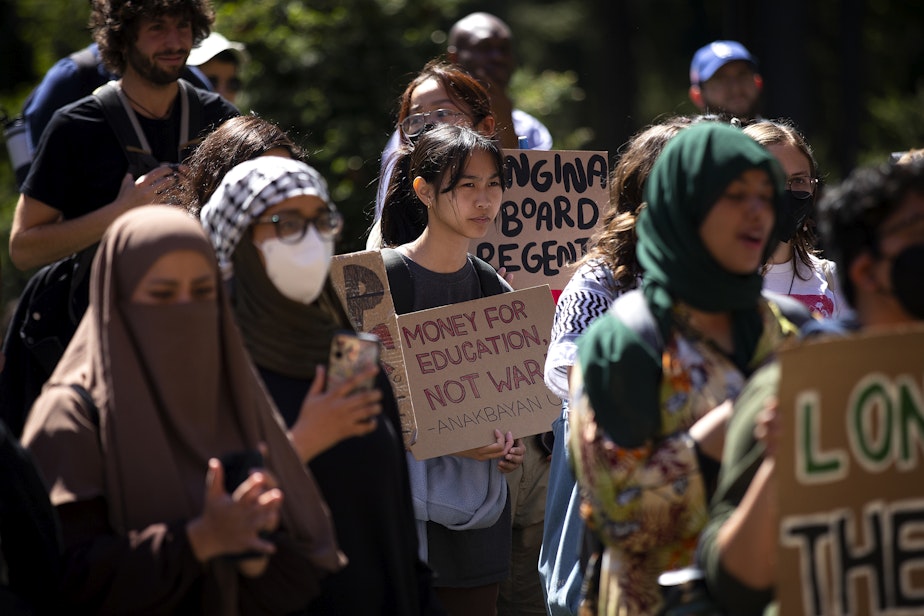 caption: University of Washington students gather ahead of the UW Board of Regents meeting on Thursday, May 9, 2024, on campus in Seattle.