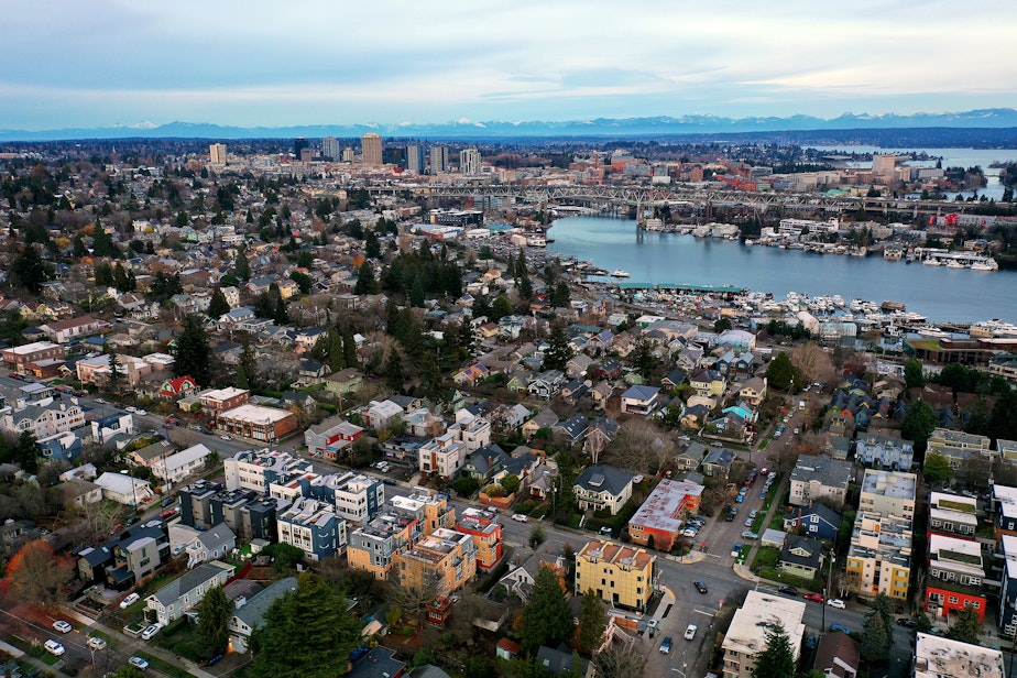 caption: Fremont and the University District neighborhoods are shown as the sun goes down on Tuesday, December 10, 2024, in Seattle.