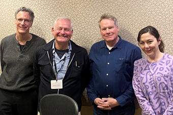 caption: Bill Radke discusses the week’s news with PubliCola’s Erica Barnett, Washington Policy Center’s Paul Guppy, and Earth Finance’s Reuven Carlyle