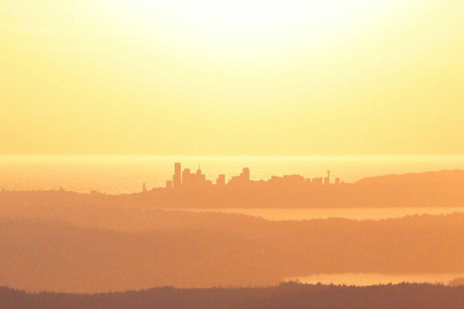 caption: A sunny day radiating above Seattle and Puget Sound. According to the National Weather Service, Western Washington will lean into above normal temperatures May through July 2024, with below average precipitation.