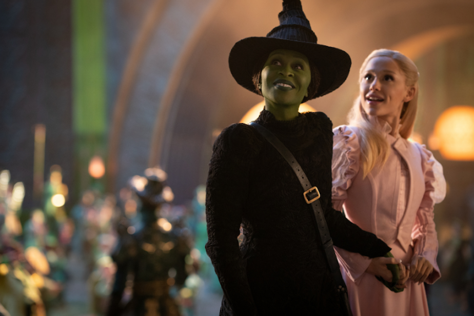 caption: Cynthia Erivo stars as Elphaba (the Wicked Witch of the West), and Ariana Grande stars as Glinda in "Wicked", the 2024 film adaptation of the Broadway musical that has been a hit for two decades.